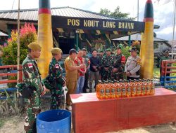 Berkomitmen untuk Jaga Keamanan di Perbatasan,Satgas Yonarhanud 12/SBC dan Yonzipur 8/SMG Bersama Laksanakan Pemusnahan Penyelundupan Miras