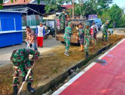 Anggota Koramil 1419-01/Maiwa Bersama Masyarakat Kerja Bakti Pembersihan Selokan