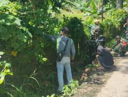 Anggota Koramil 01 Maiwa Melaksanakan Karya Bakti Pembersihan Selokan