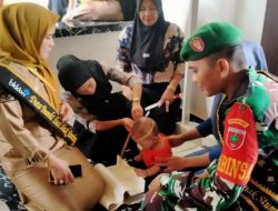 Wujudkan Balita Sehat, Babinsa 1407-21/Palakka Dampingi Petugas Kesehatan Berikan Layanan Posyandu