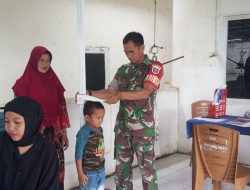 Babinsa Koramil 15/Mare Bersama Petugas Kesehatan Laksanakan Posyandu Balita Di Desa Lapasa